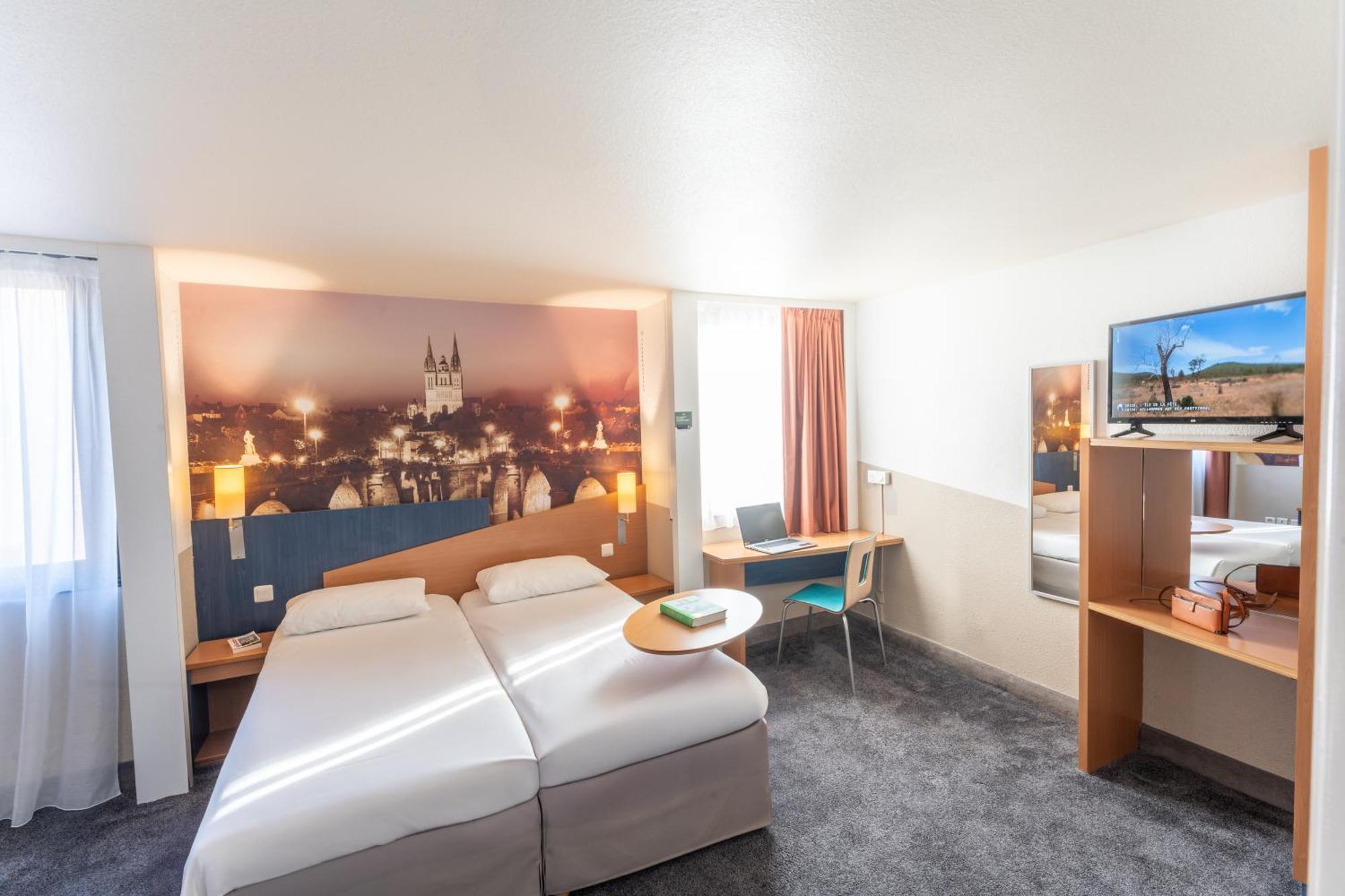 Chambre Standard avec 3 Lits Simples